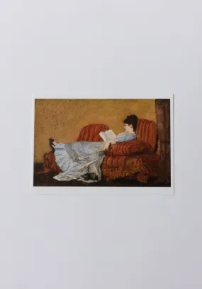 Young Lady Reading Postcard